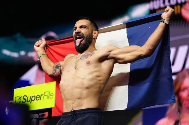 Benoit Saint-Denis holding the France flag