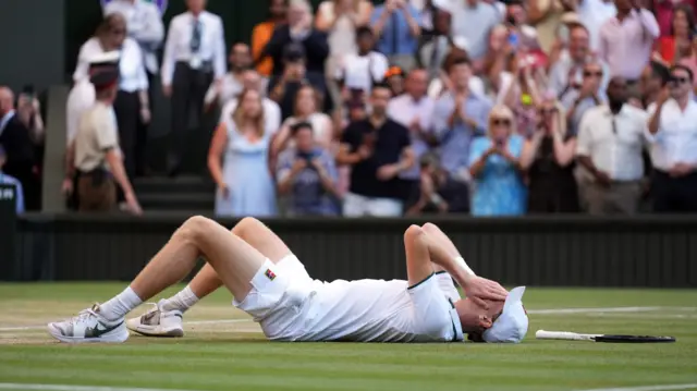Jannik Sinner celebrates winning the Wimbledon title