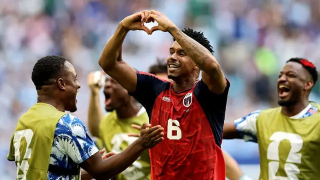 Kevin Pina #6 of Cabo Verde celebrates with teammates after scoring the team's first goal during the FIFA World Cup 2026 Group H match between Uruguay and Cabo Verde at Miami Stadium on June 21, 2026 in Miami Gardens, Florida