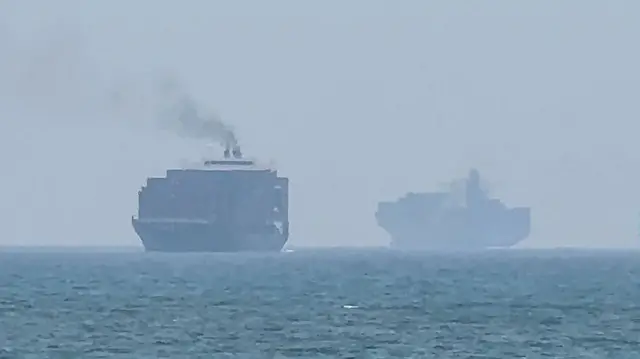 Two large ships pictured in the Strait of Hormuz on 12 July.