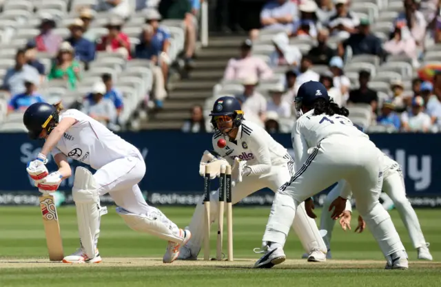 England's Lauren Bell gets bowled out by India's Deepti Sharma