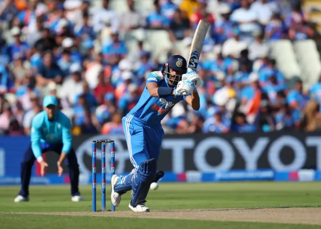 Axar Patel clips one through mid-wicket