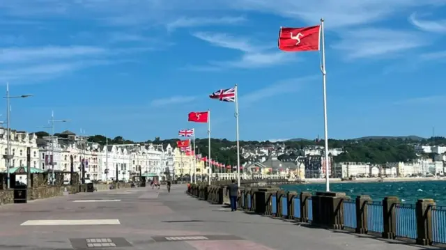Union jacks and Isle of Man flags along Douglas Promenade