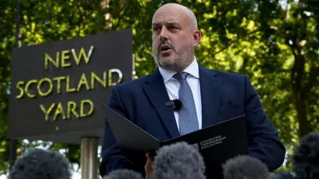 Head of Counter Terrorism Policing, Assistant Commissioner Laurence Taylor, reads a statement on the investigation into the death of Ann Widdecombe outside New Scotland Yard