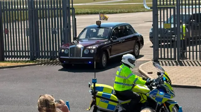 A car pulls out of an airport