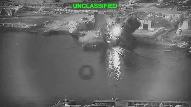 A screenshot from a video released on 13 July by the US military, which it says shows an attack on a maintenance facility in Bandar Abbas, Iran