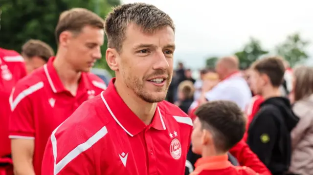 Former Kilmarnock midfielder Brad Lyons is making his Aberdeen debut