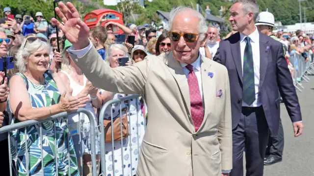 The King waves to the crowds on the Isle of Man
