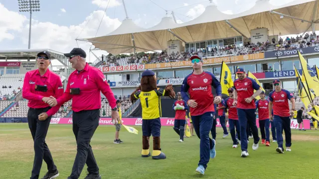 Players come onto the field at Hampshire