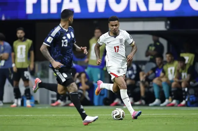 Cristian Romero of Argentina and Morgan Rogers