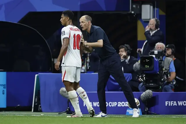 Jude Bellingham of England and England manager Thomas Tuchel
