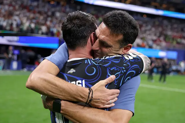 Lionel Scaloni, Head Coach of Argentina, celebrates with Lionel Messi