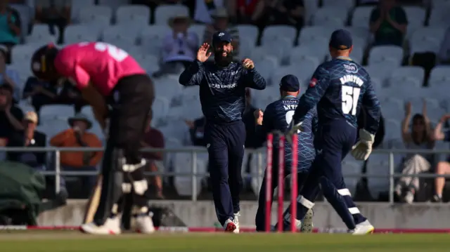 Moeen Ali smiles