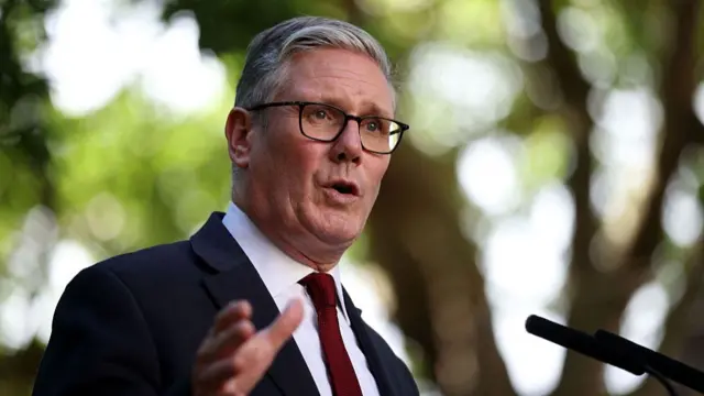 Britain's Prime Minister Keir Starmer speaks during a reception for NHS staff at 10 Downing Street in London on July 6, 2026.