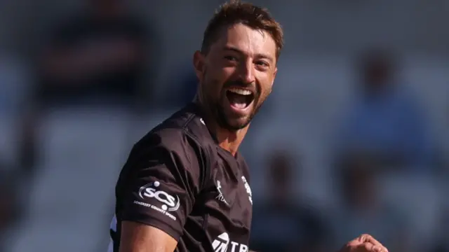 Daniel Sams celebrates taking wicket