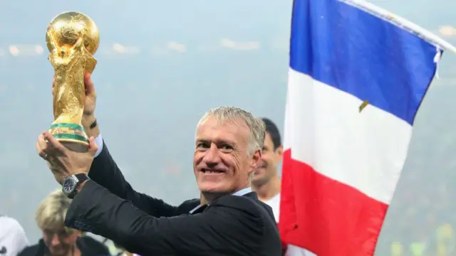 Didier Deschamps lifts the World Cup trophy