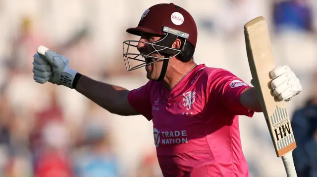Craig Overton celebrates scoring the winning runs