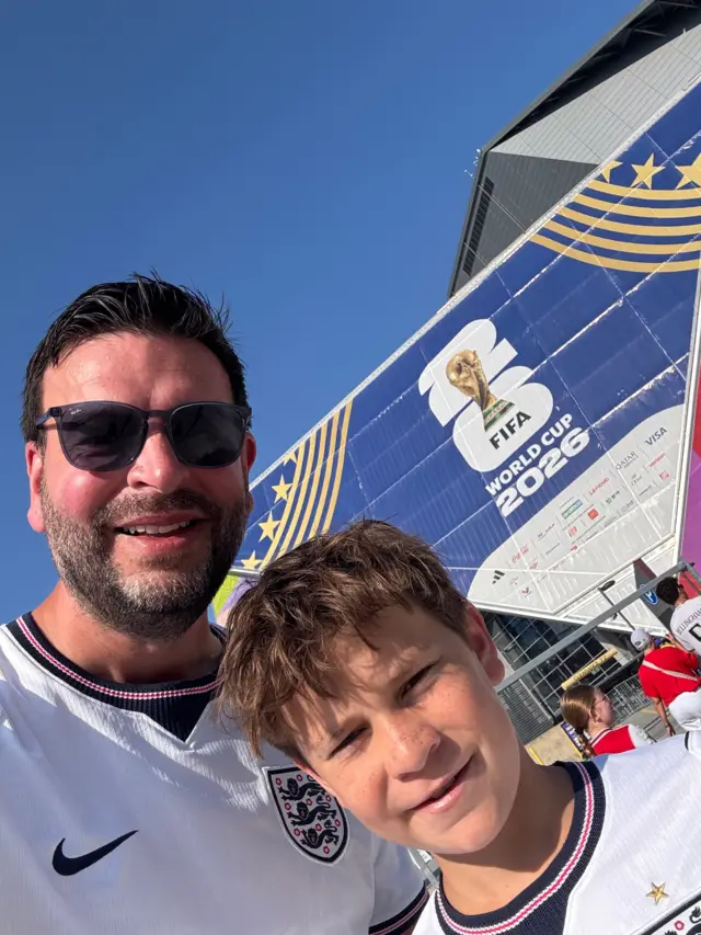 Farther and Son outside the stadium