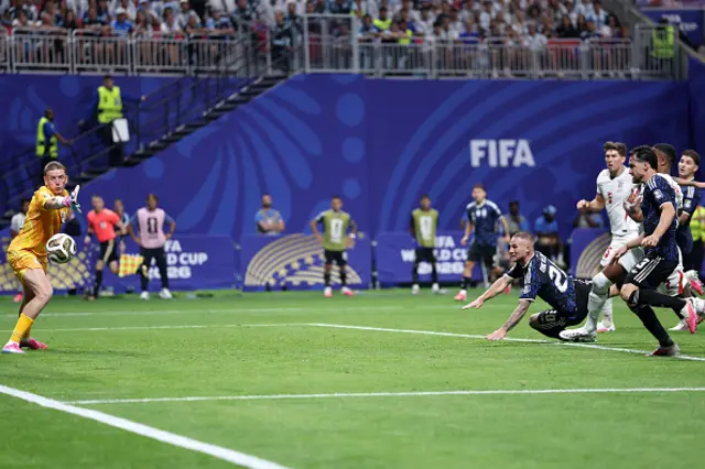 Alexis Mac Allister #20 of Argentina attempts a header