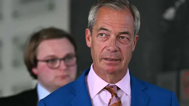 Reform UK Leader Nigel Farage leaves Millbank Tower after making a televised speech in which he resigned as MP for Clacton, in central London on July 7, 2026