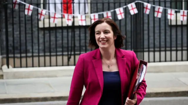 British Education Secretary Bridget Phillipson walks past bunting with St George's Cross flags at Downing Street, following a cabinet meeting, in London, Britain, July 15, 2026