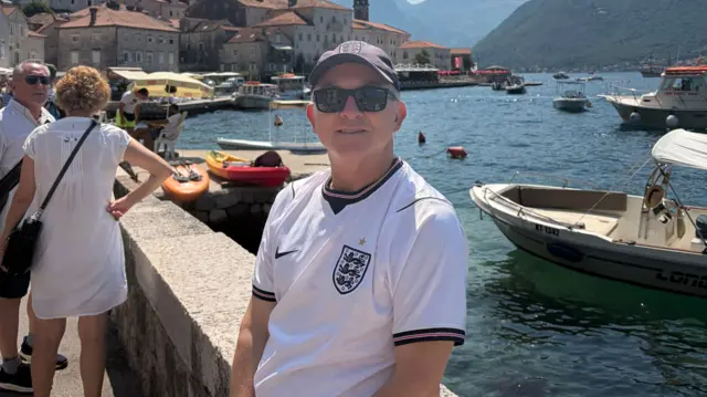 A man called Simon in an England shirt