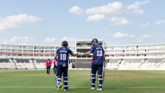 Essex batters at the edge of the field