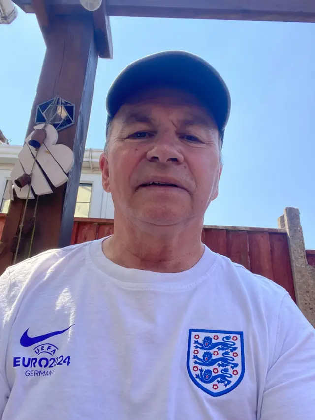 Ian in an England shirt