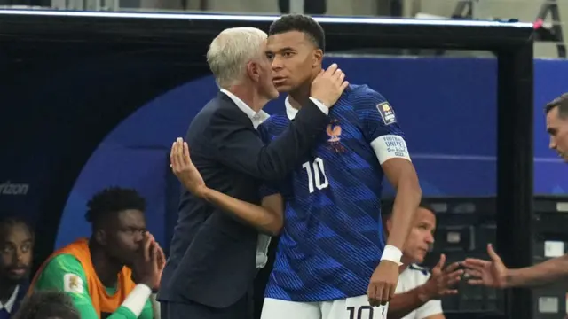 Kylian Mbappe and Didier Deschamps
