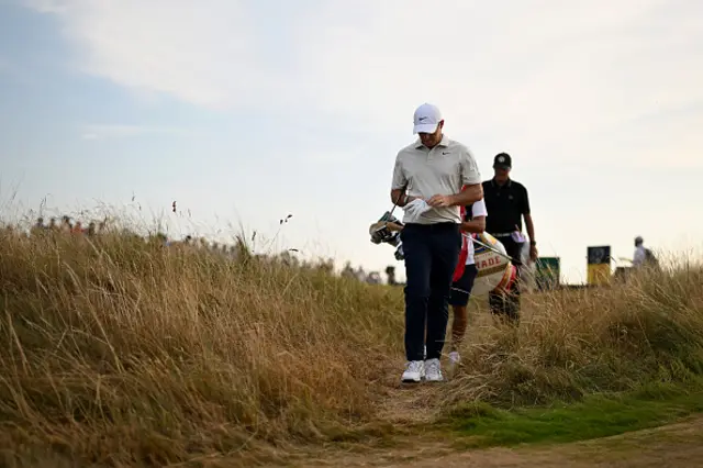 Rory McIlroy of Northern Ireland walks off
