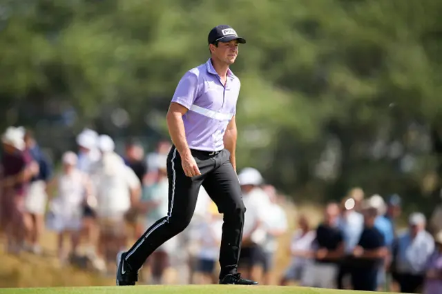 Viktor Hovland looks on