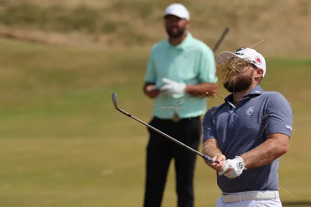Tyrrell Hatton plays from the rough on the 10th hole