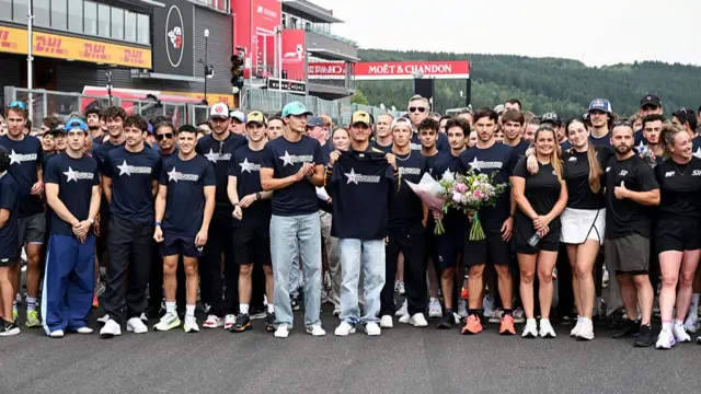 drivers of F1, F2, F3 pose for a photo, all wearing shirts in honour of Anthoine Hubert