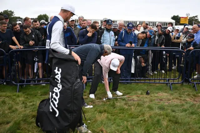 Robert MacIntyre takes a drop during the 2023 Open at Hoylake.