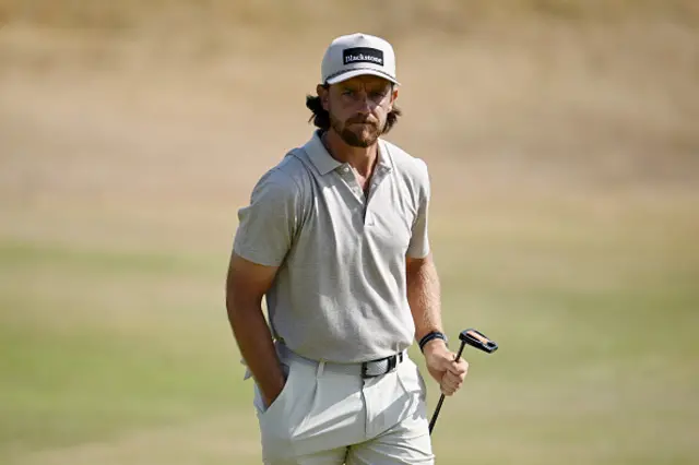 Tommy Fleetwood of England looks on