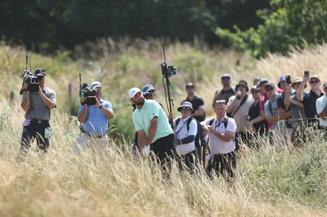 Scottie Scheffler of the United States plays a shot