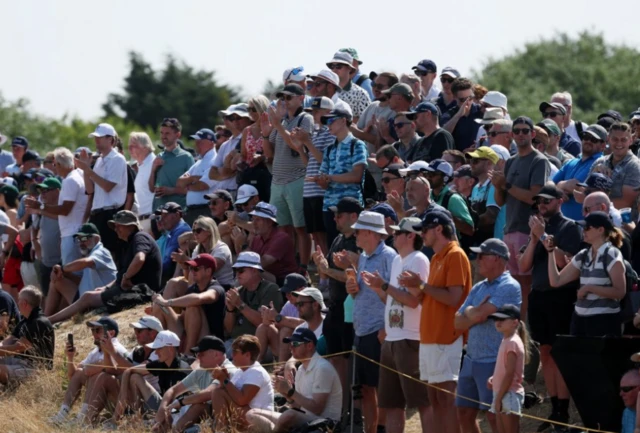 Spectators during the first round
