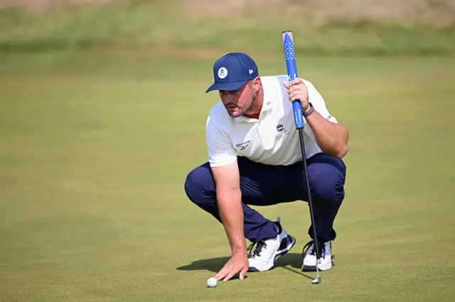 Bryson DeChambeau of the United States lines up a putt