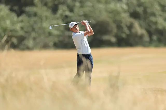 Collin Morikawa of the United States plays a shot