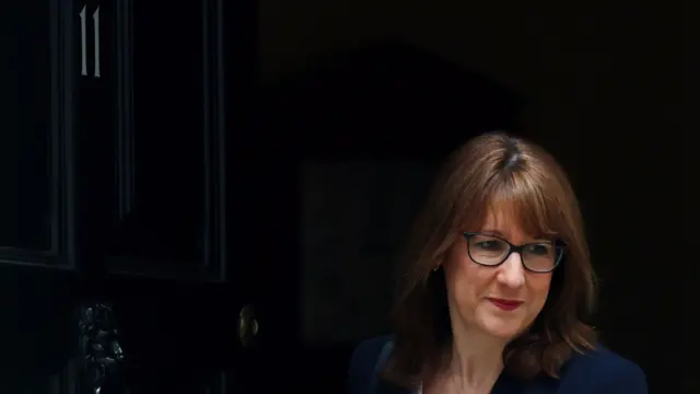 British Chancellor of the Exchequer Rachel Reeves walking out of the door at 11 Downing Street