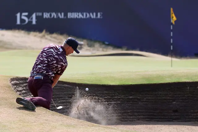 Matt Wallace hits out of a bunker