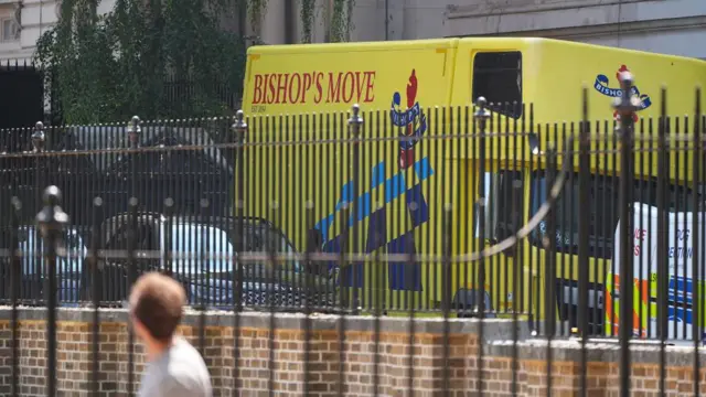 Yellow removal van outside No 10