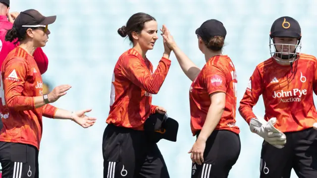 Charli Knott celebrates her fourth wicket