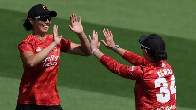 Georgia Elwiss celebrates