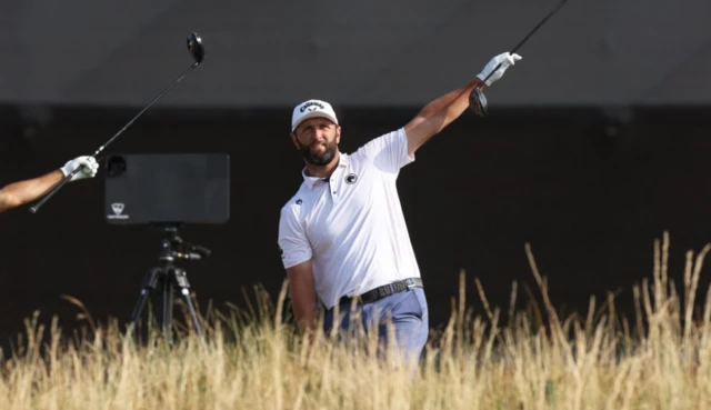 Spain's Jon Rahm looks at his tee shot