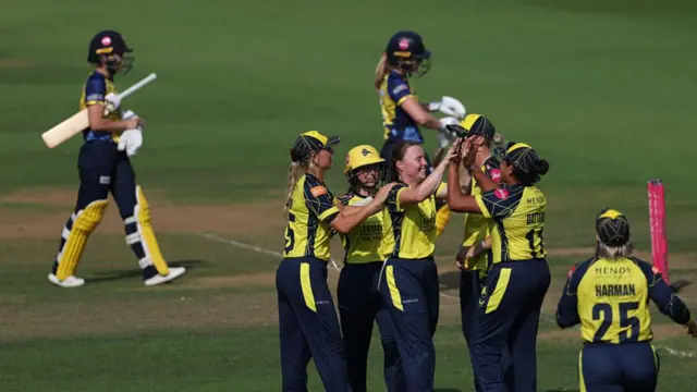Hampshire celebrate Emily Windsor's wicket