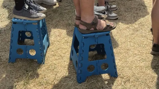 Standing on a box