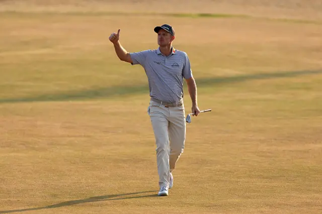 Justin Rose of England acknowledges the crowd