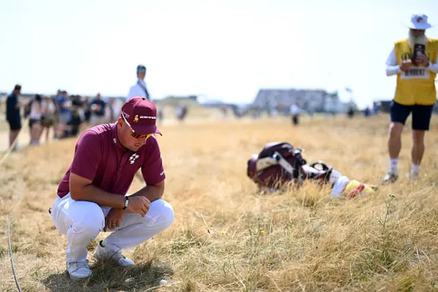 Lucas Herbert of Australia checks the position of his ball
