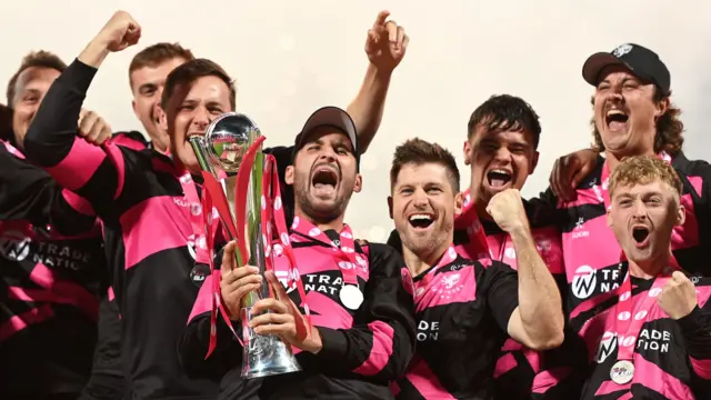 Somerset players gathered behind captain Lewis Gregory after winning the T20 Blast in 2025